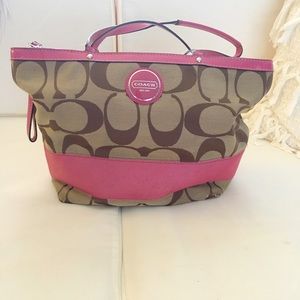 Brown and pink Coach handbag